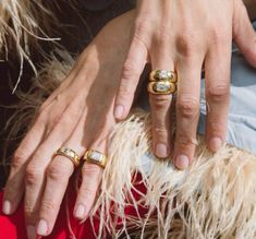 two people with rings on their fingers