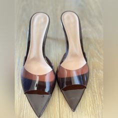 Slip On | Leather Lining & Insole | 100% Thermoplastic Polyurethane (Tpu) Modern Brown Heels With Contrasting Heel Counter, Elegant Brown Mules With Contrasting Heel Counter, Luxury High Heels With Translucent Outsole, Clear Leather High Heels, Luxury Brown Mules For Party, Formal Leather Sandals With Translucent Outsole, Modern Formal Sandals With Translucent Outsole, Formal Clear Heels With Contrasting Heel Counter, Luxury Heels With Clear Strap For Formal Occasions