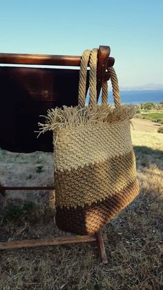 Paper rope straw bag is an ultimate summer bag. It can keep a lot of little things that no woman can do without.  Can be used like beach bag, market shopping bag, daily and holiday bag. High quality great handmade gift for any occasion and for women any age. more crochet bag here https://etsy.me/3mXZ93a Dimentions: height 12`` (30 cm) length 1845 cm) depth 4`` (11 cm) Small pocket inside This crochet tote bag is smooth, strong, soft, breathable, hypo-allergenic, does not gather dust or dirt - lightweight, does not wrinkle, easy to wash Paper raffia (natural cellulose) yarn is tolerate well humid conditions and, due to the tight crochet, it does not ignite easily. CARE: hand washable in cold water 30 C. Dry flat. Special designs can be created by combining different colors according to the Eco-friendly Macrame Straw Bag For Vacation, Eco-friendly Macrame Straw Bag For Summer, Eco-friendly Summer Beach Bag With Macrame, Summer Macrame Straw Bag, Eco-friendly Macrame Beach Bag For Summer, Beige Macrame Beach Bag, Summer Travel Straw Bag With Macrame, Casual Straw Bag With Macrame For Beach, Casual Macrame Straw Bag For Beach