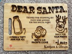 a wooden sign that says, dear santa thanks for stopping by enjoy some cookies for this special night