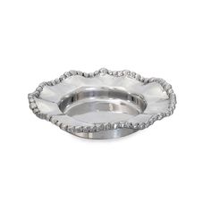 a silver plate with beaded edges on a white background