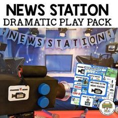 the news station dramatic play pack is on display in front of a wall with pictures