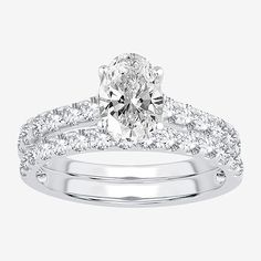 Ring Style: Bridal Sets, Engagement Rings, Single Center Rings# Pieces In Set: 2Features: In A Gift Box, Certified DiamondsDiamond Clarity: Si1-Si2Setting: Multi-SettingShape: OvalStone Cut: OvalDiamond Color: H-IMetal Color: WhiteCenter Stone Weight: 1 Ct.Ring Gallery Height: 7mmRounded Carat Weight: 2 Ct. T.w.Metal: 14k White GoldBand Width: Care: Wipe CleanStone Type: 30 Lab Grown DiamondAuthenticity: Lab Grown DiamondCountry of Origin: Imported Oval Bridal Set, Oval Shaped Engagement Rings, Ring Style, Wedding Matches, Bridal Set, Modern Bride, Ring Band, Bridal Sets, Wedding Ring Bands