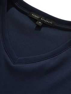 Also known as the Georgia V-neck T-shirt. It is the equally comfortable and stylish brother of The Barakett Tee. Made with our exclusive Georgia fabric with Soft Water finishing, it’s the ultimate in comfort, luxurious hand feel, and clean appearance. A versatile piece in any man’s wardrobe; elevate any look with the most comfortable V-neck ever. 100% USA grown Pima cotton Color retention up to 50 washes Shape retention engineering Soft Water, Change Of Address, Pima Cotton, Georgia, Engineering, V Neck, Wardrobe, Water, Fabric