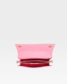 Elevate your style with this luxurious Baby Pink Camila Shoulder Purse, a perfect blend of elegance and practicality. This purse is crafted from high-quality faux leather for the modern woman, offering a unique textured finish that stands out in any crowd. Whether you're heading to a special event or just need an everyday accessory, this purse seamlessly fits into any scenario, making it a versatile addition to your wardrobe. Trendy Textured Leather Formal Bag, Elegant Textured Faux Leather Bag, Evening Bag In Textured Faux Leather, Luxury Pink Clutch Flap Bag, Elegant Leather Flap Bag For Party, Elegant Leather Party Flap Bag, Chic Textured Leather Clutch For Party, Party Shoulder Bag In Textured Leather, Textured Leather Shoulder Bag For Party