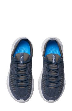 Featuring a footbed with textured pods to match the pressure map of a foot, this sporty knit sneaker is packed with tech to deliver long-lasting comfort. Reduced seams and soft lining make it ideal for sockless styling. Lace-up style Cushioned footbed Textile upper/synthetic lining and sole Imported Casual Nylon Running Shoes With Cushioned Footbed, Slip-on Low-top Sneakers With Gel Cushioning, Casual Slip-on Sneakers With Air Cushioning For Light Sports, Casual Running Shoes With Cushioned Footbed And Engineered Mesh, Dynamic Sneakers For Light Sports With Textured Sole, Mesh Running Shoes With Textured Sole For Sports, Casual Running Shoes With Textured Sole For Light Sports, Sports Running Shoes With Textured Mesh Sole, Sports Mesh Running Shoes With Textured Sole