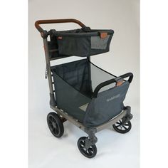 a stroller with wheels and a basket on the front is shown in this image