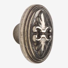 an antique style door knob on a white background