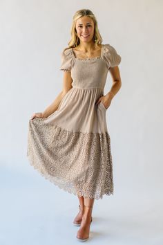 Turn heads in the unique and playful Hollberg Crochet Hemmed Midi Dress in Stone. This midi dress features crochet detailing along the hem for a touch of whimsy, while the stone color adds a chic and sophisticated touch. Perfect for any occasion, this dress is sure to become a staple in your wardrobe. Details self/lining: 100% polyester Fabric Care Guide Here Sizing & Fit Measurements are approximate and taken while laying flat across the front. Not doubled. small: bust = "; waist = "; length = Bohemian Midi Dress With Lace Trim For Day Out, Bohemian Beige Dress With Smocked Bodice, Beige Midi Dress With Lace Trim For Garden Party, Bohemian Midi Dress With Lace Trim For Brunch, Bohemian Crochet Midi Dress For Brunch, Lace Midi Dress With Lace Trim For Day Out, Chic Crochet Trim Midi Dress For Spring, Spring Crochet Dress With Lace Trim For Garden Party, Beige Lace Trim Midi Dress For Garden Party