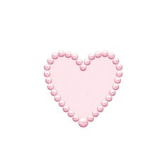 a pink heart shaped object with pearls on it