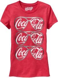 a women's coca cola t - shirt with sunglasses on it