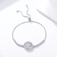 SKU#: JU005BTBracelet InformationMetal: 925 Sterling SilverTotal Weight: 6.0gClasp Type: Slider ClaspChain Type: Box ChainChain Length: 10′??25cmTree of Life Size: 1.7*1.7cm*Customized service of this item is available. please contact our customer service to place orders. Please notice that: the change of the stone color and plating color is available while the material of gemstones and metal cannot be accepted.*All stone weights (CT.) are approximate and listed as diamond equivalent weight in c Silver Tennis Bracelet, Oval Cut Engagement Ring, Stackable Wedding Bands, Sterling Silver Wedding Band, Link Chain Bracelet, Silver Wedding Bands, Bracelet Charm, Ring Size Guide, The Change