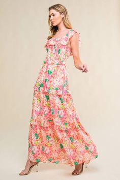 A printed woven midi dress featuring off shoulder neckline with ruffles, smocked bodice and tiered skirt with ruffles Details: Self : 100% PolyesterLining : 100% Polyester Size & Fit - Model is 5`8" And Wearing Size Small- Measurements Taken From Size Small- Approx. Length: 56" Multicolor Tiered Dress With Ruffles, Multicolor Tiered Maxi Dress With Smocked Bodice, Multicolor Tiered Dress With Ruffles For Vacation, Pink Maxi Dress With Smocked Bodice And Tiered Skirt, Multicolor Ruffled Tiered Dress For Vacation, Multicolor Dress With Smocked Back And Ruffled Straps, Pink Off-shoulder Maxi Dress With Ruffles, Pink Off-shoulder Ruffled Maxi Dress, Floral Print Tiered Ruffle Dress For Vacation