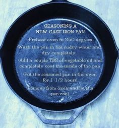 a cast iron skillet on a wooden table with the words seasoning a new cast iron pan