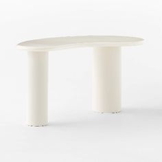 an oval white table with two legs and a curved top, on a white background