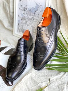 Black Leather Wingtip Oxford Shoes with Brogue Detailing Black Wingtip Brogue Lace-up Shoes, Semi-formal Oxford Shoes With Brogue Detailing, Black Wingtip Oxford Lace-up Shoes, Masculine Brogue Oxfords Lace-up, Black Leather-sole Lace-up Oxfords, Wingtip Oxford Shoes, Leather Brogues, Wingtip Oxford, Oxford Shoes Men