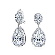 PRICES MAY VARY. STUNNING DESIGN- Bring out your inner glam with these stunning clear CZ silver plated teardrop earrings. Fit for a fashionista and bride, these stunners have CZ stones surrounding the teardrop crystal. Order these today. Measure: 2 inch L x 0.5 inch W Weight: 13.4 gram Material: Brass, Silver Plating, Cubic Zirconia Affordable Alterative to Diamonds-Buy Cubic Zirconia: Show your love for the Earth and your sweetheart by choosing cubic zirconia jewelry gifts. Lab created CZ reduc Tear Drop Diamond, Earring Png, Teardrop Bridal Earrings, Clip On Earring, Womens Earrings, Friend Jewelry, Earring Silver, Prom Jewelry, Teardrop Dangle Earrings