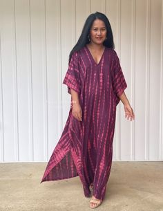 "DETAILS * Oversized * Bust/Waist/Hips 37\" wide, circumference 72\" * Approx. 50\" & 52\" long from shoulder to hem * V neckline both front & rear * Loose silhouette * Side slits * Slipover style * Rayon fabric with hand tie dye * Gentle machine wash with low heat dry, first wash separately * Model tall 5'4\"/164 cm. wearing 55\" L. * Style CM" Bohemian Tie-dye V-neck Maxi Dress, Summer Beachwear Kaftan With Batik Print, Long Tie-dye Dress For Beach Cover-up, V-neck Batik Print Kaftan For Beach, Summer Batik Print Tunic Maxi Dress, Tie Dye Free Size Maxi Dress For Festival, Purple Tunic Kaftan For Summer, Tie Dye Long Dress For Beach Cover-up, Long Tie Dye Dress For Beach Cover-up