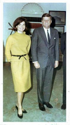 a man and woman standing next to each other