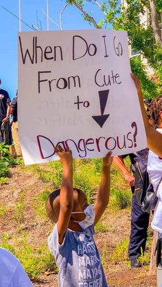 two children holding up a sign that says when do i go from cute to dangerous?