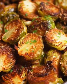 cooked brussel sprouts with parsley in a pan