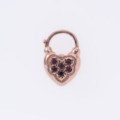 Gold Heart Padlock with Garnet stones set in 14K Rose Gold Details and Measurements: ► 14 Karat Rose Gold ► Length 21mm / 13mm / 14mm width ► 6 Garnet 2 mm ► Total Weight 4.1 gr All items are Handmade, I pay a lot of attention for every detail in the jewelry I design. All of my items are hand crafted in Kisufim's Designer jewelry Store in Tel Aviv, and shipped direct to customers all over the world.  I am proud to say that many celebrities, models and stars across the world wear my jewelry. ►► F Antique Rose Gold Heart Jewelry, Luxury Rose Gold Jewelry With Box Clasp, Certified Rose Gold Heart Cut Jewelry, Vintage Padlock, Grey Diamond Ring, Heart Padlocks, Heart Gemstone, Garnet Stone, I Design