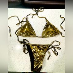 Shein Metallic Gold Bikini. Size Medium. Never Worn. Great Condition. Metallic Summer Swimwear For Vacation, Gold Swimwear For Beach Party, Fitted Gold Swimwear For Summer, Gold Fitted Swimwear For Beach Season, Gold Swimwear For Party And Beach Season, Gold Fitted Swimwear For The Beach, Gold Fitted Swimwear For Beach, Fitted Gold Swimwear For Beach, Gold Fitted Swimwear For Pool