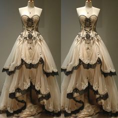 two mannequins are dressed up in dresses made from fabric and tulle