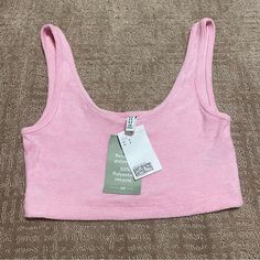 Adorable Light Pink Terry Fabric Crop Top. Perfect For Summer! New With Tags From H&M. Very Soft, Comfortable, And Stretchy Fabric. I Have This In Other Colors, For Size Reference I Am A Size Small, 34dd Bust And This Was Cute Crop Top On Me, More Of A Belly Shirt/ Bralette. Because Of This Type Of Material Would Look Great Over Your Bikini Top Too! Would Have More Coverage On Someone With A Smaller Chest Size. Looks Great With Anything High Waisted. Love This, Just Downsizing! Please See Photos Pink Cotton Scoop Neck Crop Top, H&m Cotton Tops For Loungewear, Pink Cotton Crop Top With Scoop Neck, H&m Pink Sleeveless Top, H&m Tops For Summer Loungewear, H&m Summer Loungewear Tops, H&m Cotton Casual Crop Top, H&m Casual Cotton Crop Top, Trendy H&m Cotton Crop Top