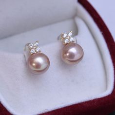 White 10-11mm Freshwater Pearl Shiny Earrings Crafted with 10-11mm purple freshwater pearls, these earrings will be a stand-out in any collection. With a timeless design, you will be able to enjoy these for many years. Perfect for day or evening wear, these earrings make a stunningly beautiful statement and are sure to draw admiring glances. This popular earrings design features AAAA quality, round freshwater pearls measuring 10-11mm. Material: Freshwater Pearl with 925 sterling silver or gold v Elegant Pink Pearl Earrings For Anniversary, Elegant Purple Pearl Earrings, Elegant Purple Pearl Earrings For Formal Occasions, Elegant Purple Pearl Earrings For Anniversary, Elegant Pink Pearl Earrings For Formal Occasions, Shiny Earrings, Popular Earrings, Earrings Design, Earring Crafts