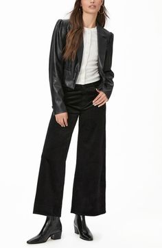 "Find PAIGE Harper Wide Leg Ankle Corduroy Pants on Editorialist. A contemporary ankle crop breathes new life into a pair of wide-leg pants cut in a high-waist silhouette from classic corduroy. 25\" leg opening; 12\" front rise 98% organic cotton, 2% elastane Machine wash, line dry Imported" Black Curdory Pants, Chic Corduroy Wide-leg Pants, High-waist Black Corduroy Pants, Ankle-length Corduroy Pants, High Waist Non-stretch Corduroy Bottoms, Black Coated Jeans, High Rise Pants, Ankle Pants, Corduroy Pants