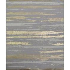 an abstract painting with gold and grey stripes on the side of a gray area rug