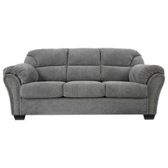 a gray couch sitting on top of a white floor