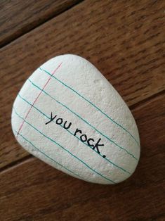 a rock with the words you rock written on it