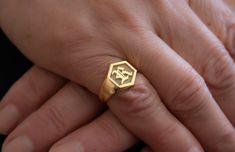 Custom Signet Ring, Hexagon Signet Ring, Old English Font Silver Ring, Custom Family Crest Ring, For Men, Women ---● P R O D U C T - D E S C R I P T I O N ●--- MATERIAL -Silver, Gold, Rose Gold -RING FACE 12mm (0,47inch) -All the products you order will be prepared conscientiously and shipped to you. PRODUCT DETAILS -I can engrave your family crest, your college logo, or any other image or initials on an oval signet ring that you request. -Please contact me for your engraving logo and special dr Mens Custom Jewelry, Family Crest Ring, Family Crest Rings, Hexagonal Ring, English Font, Old English Font, Family Rings, Mom Ring