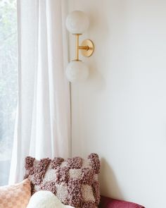 This teen bedroom design by @em_henderson is too cute! Key pieces like the Allenglade Chandelier and Argyle Double Sconces create a timeless foundation that can live through eras of changing tastes. Design by @em_henderson, photo by @kaitlinmgreen_photo