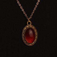 Ask Me About My Custom Pieces. I Can Make Any Color Or Style. Handmade By Jewel Vintage Oval Pendant Epoxy Oval Dark Red Pendant Transparent 20 Inch Gold Chain Luxury Oval Pendant For Jewelry Making, Gold Red Necklace, Red Oval Pendant Vintage Necklace, Vintage Red Oval Pendant Necklace, Red Vintage Oval Pendant Necklace, Medieval Jewelry Aesthetic, Gold Vintage Necklace, Red Stone Jewellery, Historian Outfit