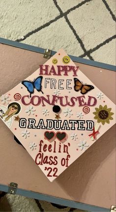 a decorated graduation cap with the words happy free congratulated