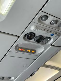 the control panel on an airplane's cabin is shown in this close up photo