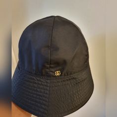 Brand New With Price Tag Gg Logo Motif Material - Nylon Size - Medium Retailed Brand New $610 Plus Tax Totaled $670 Gucci Adjustable Bucket Hat, Elegant Gucci Adjustable Hat, Gucci Elegant Short Brim Hat, Elegant Gucci Short Brim Hat, Gucci Designer Wide Brim Hat, Classic Gucci Hat With Embroidered Logo, Designer Black Bucket Hat, Gucci Bucket Hats, Gucci Bucket Hat