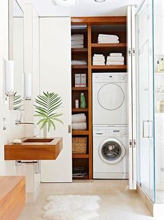 an image of a bathroom with a washer and dryer on the front page