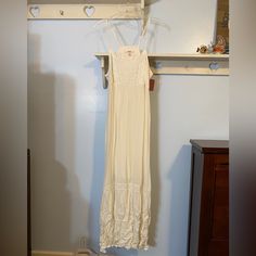 White/Ivory/Cream Bohemian Maxi Dress Never Worn, Just Wrinkly At The Bottom From Garment Bag, Would Smooth Out With Iron Or Wash White Cotton Sundress With Lace Trim, White Cotton Maxi Dress With Lace Trim, Cream Cotton Maxi Dress For Vacation, Cream Spring Sundress Maxi Dress, Cream Sundress Maxi Dress For Spring, Cream Flowy Sundress Maxi Dress, Cream Cotton Sundress Maxi Dress, Cream Cotton Maxi Sundress, Elegant White Sundress With Lace Trim