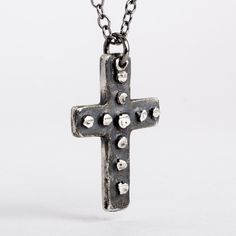 This cross is handmade of solid 925 sterling silver (92.5% pure silver) in my studio. I used a dark patina to bring out the details of the cross and give it the worn out look of time. Cross Height: 1 1/2 inch (3.5 cm) Width: 3/4 inch (2 cm) Necklace chain: choose your length Gothic Cross Necklace With Oxidized Finish, Gothic Oxidized Cross Necklace, Antique Silver Cross Necklace With Oxidized Finish, Antique Silver Oxidized Cross Necklace, Sterling Silver Oxidized Crucifix Necklace, Oxidized Sterling Silver Cross Pendant Necklace, Medieval Cross Pendant Necklace Gift, Medieval Cross Necklace As Gift, Medieval Cross Necklace For Gift