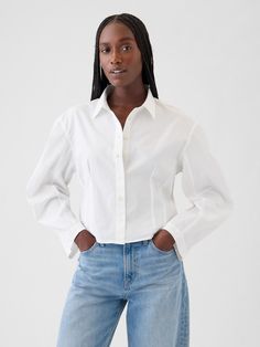 Soft cotton poplin cropped shirt.  Point collar, button front.  Long barrel sleeves.  Darting at front and back.  Fit: Close to the body.  Cropped, hits at the waist.  Models wearing Gap Collard Shirt, Classic White Shirt, Cropped Shirt, White Button Up, Pesticides, Crop Shirt, Cotton Poplin, White Shirt, Shirt Sleeves