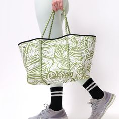 The cool, everyday bag that’s perfect for work, gym, beach, traveling, and everything in between. Large Green Casual Bag, Casual Tote Beach Bag For Travel, Green Sporty Bag For Daily Use, Casual Travel Tote Beach Bag, Casual Travel Beach Tote Bag, Casual Weekender Bag With Large Capacity For Everyday Use, Casual Weekender Bag With Large Capacity, Casual Travel Bag With Double Handle, Casual Large Capacity Weekender Bag For Everyday