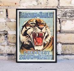 a poster with an image of a tiger on it's face and the words barnum & bailey greatest show on earth