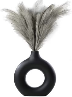 PRICES MAY VARY. 🌷【UNIQUE MODERN DESIGN 】– If you are tired of those dull and boring designs, then you will definitely be attracted by these beautiful hollow design black ceramic vases for home décor. The donut design makes the flower vases unique and stylish; you can see through the hollow out while enjoying beautiful flowers in the vase, which adds more romance and fashion to your house. 🌷【 EQUISITE & FLAWLESS DETAILS】 – Each Pampas Grass decorative vase is professionally designed and handcr Pampas Flower, Wedding Dinner Table, Donut Vase, Black Ceramic Vase, Party Living Room, Nordic Chic, Style For Wedding, Nordic Boho, Floating Shelf Decor