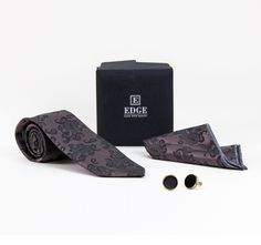 Get three items in one gift set with a tie, matching handkerchief and cufflinks. Presented nicely in a classic black box. Includes a tie, handkerchief and cufflinks Handkerchief Dimensions: Approx 11" W x 11" L Cufflinks Elegant Suit And Tie Accessories With Gift Box, Cufflinks For Father's Day Gift, Classic Rectangular Handkerchiefs For Gifts, Classic Rectangular Handkerchiefs As Gifts, Classic Handkerchiefs For Father's Day Gift, Elegant Suit And Tie Accessories Gift Box, Elegant Black Cufflinks For Gift, Black Tie Cufflinks For Father's Day, Black Cufflinks For Black Tie And Father's Day