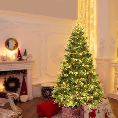 a christmas tree in a living room decorated for the holiday season with lights and presents