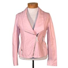 Iman Blush Leather Moto Jacket With Gold Colored Hardware Size Xs Fit S Too Nwt New With Tags Soft Leather With Stretchy Knit Fabric On The Sides Of The Jacket & The Underside Of The Arms Fully Lined Asymmetrical Front Zipper & 2 Front Zippered Pockets Please Note: The Zipper Pulls Are Covered In The Original Packing Tissue As Seen In The Photos Approximate Measurements Laying Flat: Armpit To Armpit 17” Length From Shoulder To Bottom 20.5” New With Tags In Excellent Condition Pink Zipper Closure Outerwear For Spring, Spring Leather Jacket With Asymmetrical Zip, Spring Biker Leather Jacket With Asymmetrical Zip, Pink Leather Jacket With Zipper Closure For Fall, Pink Leather Jacket With Zipper For Fall, Pink Biker Jacket For Fall Workwear, Casual Pink Leather Jacket For Fall, Fitted Leather Jacket With Asymmetrical Zip For Spring, Pink Biker Outerwear With Zipper Closure